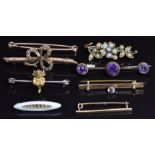 Two 9ct gold brooches set with seed pearls, a 9ct gold brooch set with amethysts (8.4g) and other