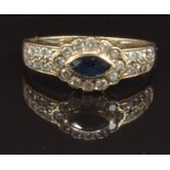 A 9ct gold ring set with a marquise cut sapphire and diamonds, size P, 2.2g