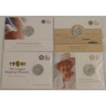 Four Royal Mint silver £20 coins, WW1 2014, HM 90th Birthday 2016, Timeless First 2013, and