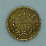 1853 gold U.S one dollar coin