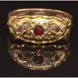 Edwardian 18ct gold ring set with three garnets and diamonds, size M, 2.6g