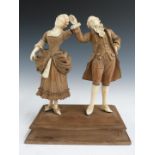 19thC continental finely carved wood and ivory figure of a lady and gentleman dancing, in the manner