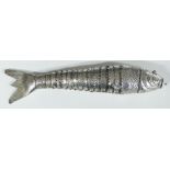 Articulated white metal novelty fish with red cabochon eyes, length 18cm, weight 67g