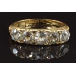 Edwardian 18ct gold ring set with five old cut diamonds and a further eight rose cut diamonds,