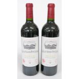 Two bottles of Chateau Grand-Puy-Lacoste 2000 Pauillac Grand Cru Classé red wine 75cl 13% vol.