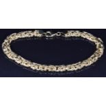 A 9ct gold bracelet made up of knotted links, 8.2g