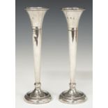 Pair of feature hallmarked silver trumpet vases, Sheffield 1977, maker A T Cannon Ltd, height 22cm