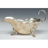 Hallmarked silver sauce boat, raised on three feet, marks rubbed, length 14.5cm, weight 92g