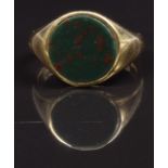 A 18ct gold signet ring set with blood stone, size M, 7.2g