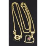An 18ct gold pendant set with a ruby on an 18ct gold chain, 3g, length 44cm