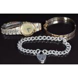 Gucci ladies wristwatch, rolled gold bangle and a silver curb link bracelet