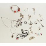 A collection of silver jewellery including earrings, necklaces, bracelets, titanium ring, etc
