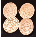 A pair of 9ct rose gold cufflinks with engraved chased decoration, Birmingham 1919, 5.4g