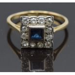 An 18ct gold ring set with a square cut sapphire surrounded by diamonds, size N, 3g