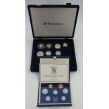 Six silver proof coins in a collector's case, together with a 1935 rocking horse crown and a 1985