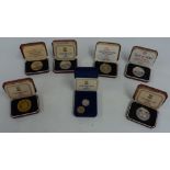 Seven Pobjoy Mint proof silver and proof coins, consisting of crowns and a £1 coin etc