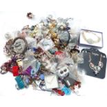 A collection of jewellery including beads, necklaces, bracelets, etc