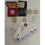 Five silver commemorative coins, one cased, some certificates