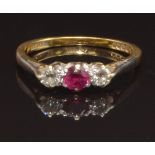 A 9ct gold ring set with a round cut ruby and two round cut diamonds, size L, 2.2g
