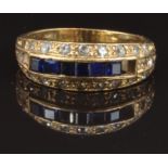 A 9ct gold ring set with square cut sapphires and paste, size O, 2.7g