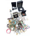 A collection of costume jewellery including silver locket, pocket watch inset with a platinum