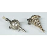 Two white metal baby's rattles, one with mother of pearl handle the other with gilt finish, length