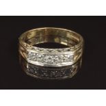 A 9ct gold ring set with cubic zirconia, size R, 2.7g