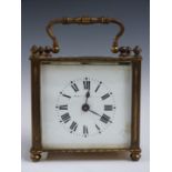 Brass carriage clock in 'squat' brass case, Mappin and Webb to enamel Roman dial, the movement