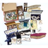 A collection of costume jewellery including beads, silver and marcasite brooches, filigree earrings,