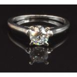 An 18ct white gold ring set with a round cut diamond of approximately 0.4ct, size I, 2.1g