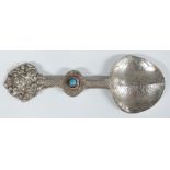 White metal Tibetan medicine spoon with turquoise cabochon, length 12.5, weight 26g