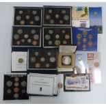 Royal Mint deluxe UK coin sets comprising 1984, 1985, 1987, 1991 and 1992, together with a silver