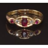 An 18ct gold ring set with rubies and diamonds, Birmingham 1919, size O, 3.7g