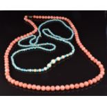 A beaded coral necklace of 91 round beads with a 9ct gold clasp and another of alternating ivory and