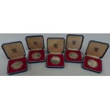 Five cased Royal Mint Silver Royal Commemorative crowns for 1977, Tristan Da Cunha, St Helena etc