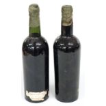 Two bottles Barros 1945 vintage port, bottled by John Porter and Gold... London, label part