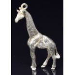 Franz Hirner 18ct gold pendant in the form of a giraffe set with two diamonds, 4 x 1.5cm, 13g