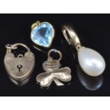 A 9ct gold pendant set with a pearl, 9ct gold clover or shamrock pendant, 9ct gold padlock clasp and