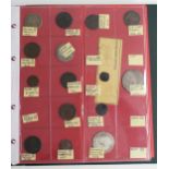 Karat coin collector's album containing an extensive collection of English coinage to include Edward