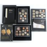 Royal Mint proof coin sets for 2010, 2011 and 2012, together with the fourth and fifth circulating