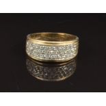 A 9ct gold ring set with three rows of cubic zirconia, size Q, 3.3g