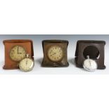 Hamilton and Inches 19thC travel clock together with one other and a spare case, together with two