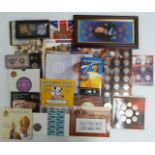 A collection of coin presentation packs to include 2009 'Blinky Bill' Australian coin set, Harry