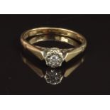 A 9ct gold ring set with a diamond, size O, 2.3g