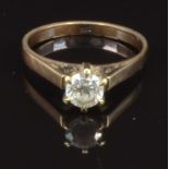 A 9ct gold ring set with cubic zirconia, size K, 2.3g