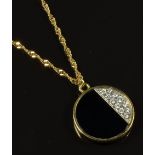 An 18ct gold pendant set with onyx and diamonds, on 18ct gold chain, 5.3g, length 46cm