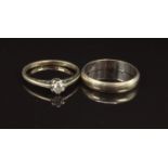 A 9ct gold ring set with a diamond and a 9ct gold wedding band/ ring, size M, 4.1g