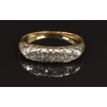 Victorian ring set with five diamonds in a scrolling setting, size L, 2.5g