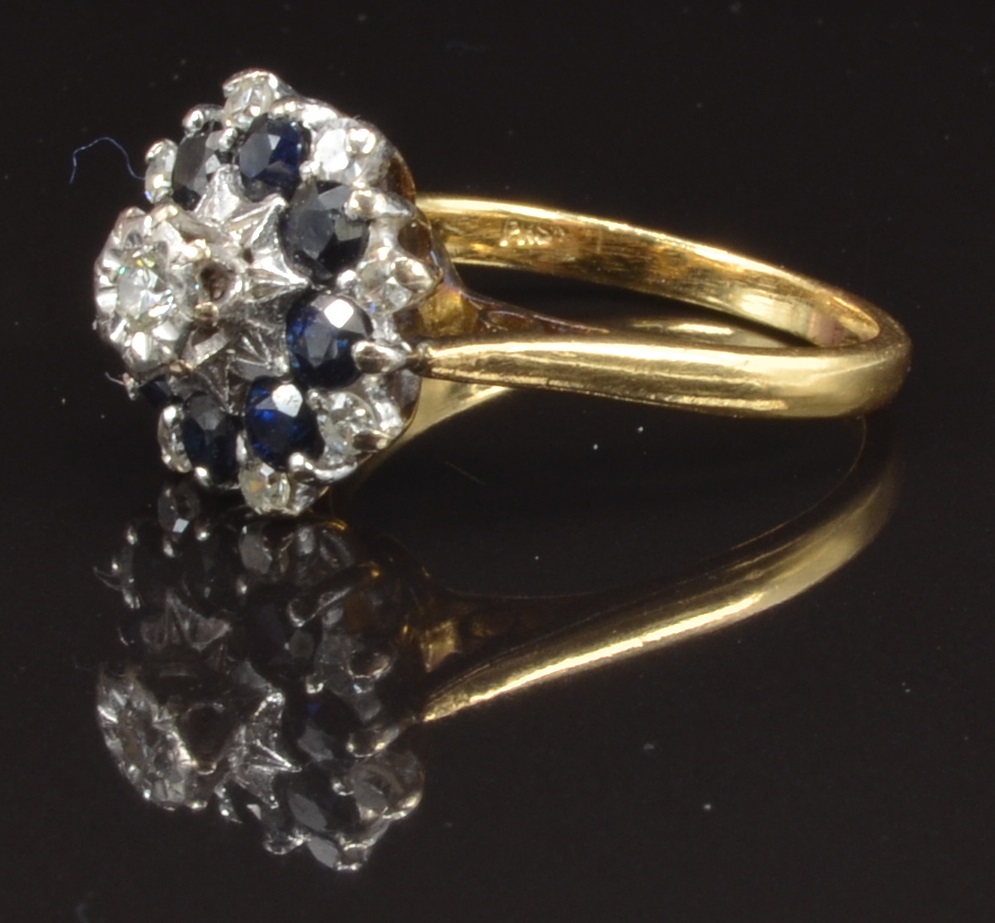 An 18ct gold ring set with diamonds and sapphires in a cluster, size M, 5.4g - Image 2 of 2