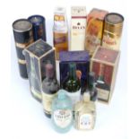 Six bottles of whisky including two Grant's, Johnnie Walker Red Label, Bell's Special & Glenfiddich,